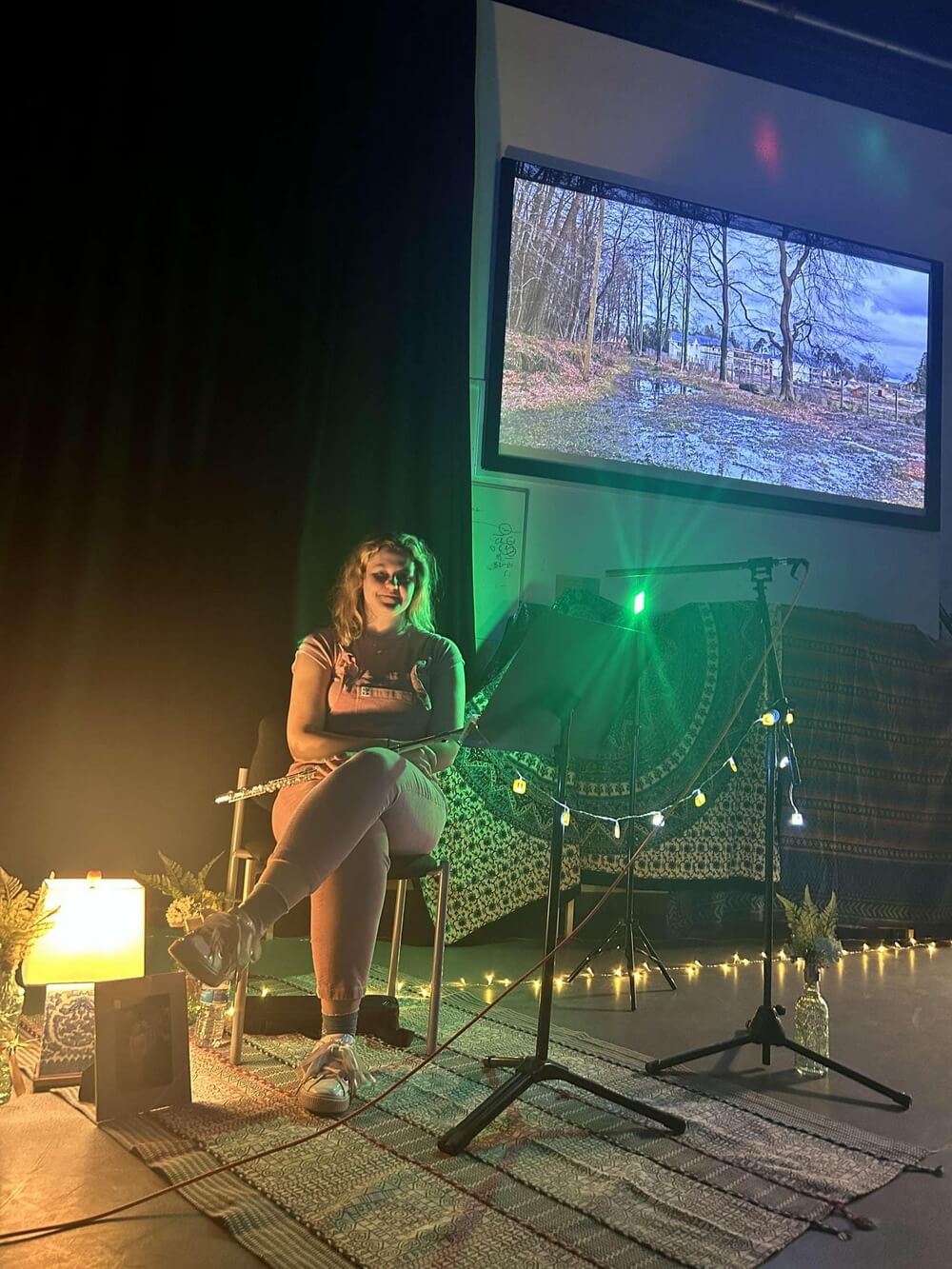 Kathryn playing flute during the performance