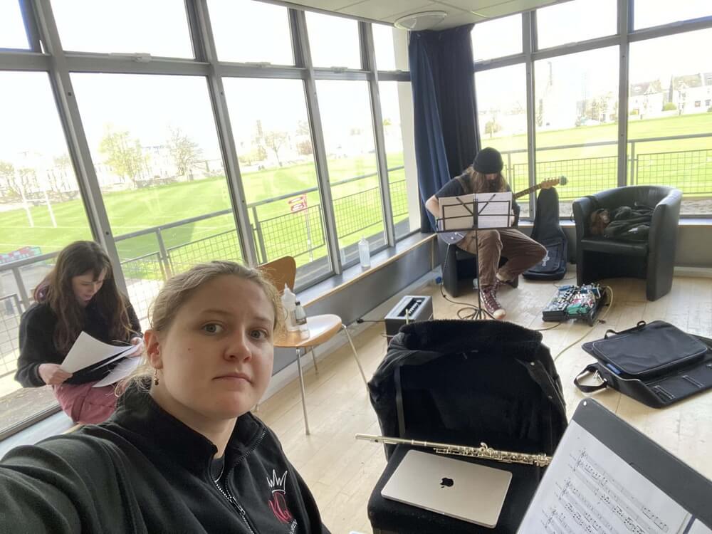 Collaborators working through the graphic scores in the rehearsal room